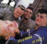 Guana Batz - Held Down To... At Last